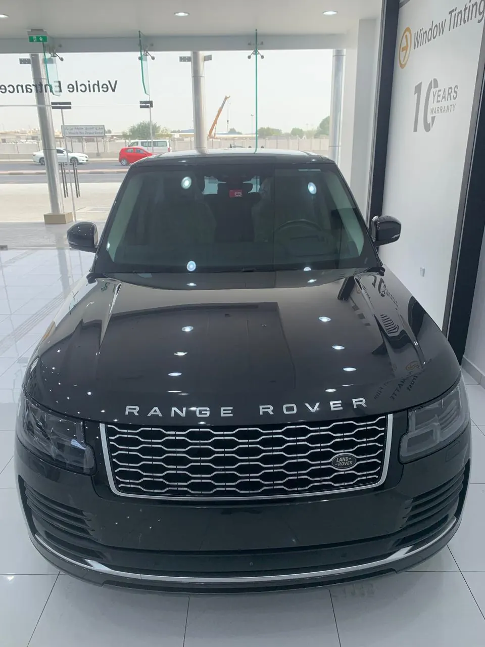 Automotive window film installation on Range Rover — Solar Gard