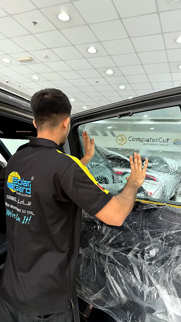 Solar Gard window tint installation in progress — Shamil Trading Sharjah